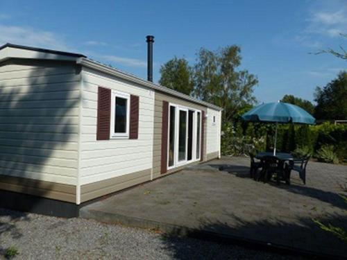 Fotografie z fotogalerie ubytování Mobilheim für 5 Personen ca 35 qm in Baarle-Nassau, Nordbrabant v destinaci Baarle-Nassau