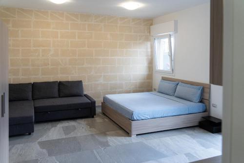 Et opholdsområde på Casa Vacanza Mario 2D a 180 mt dal mare di Punta Prosciutto