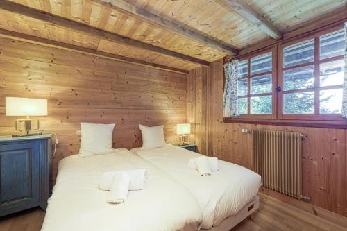 Ένα ή περισσότερα κρεβάτια σε δωμάτιο στο Homency - Chalet Alpaga