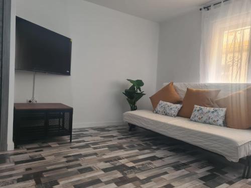 Una televisión o centro de entretenimiento en Apartamento Soria Calaverón