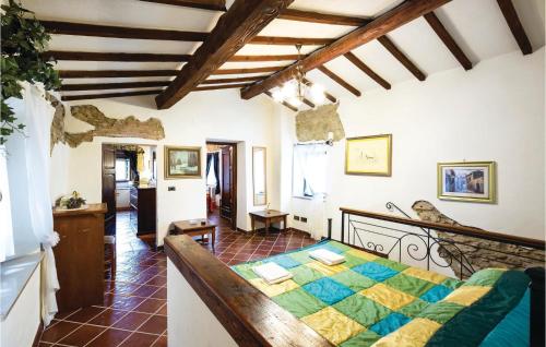 a bedroom with a bed in a room at Le Viole in Ulignano