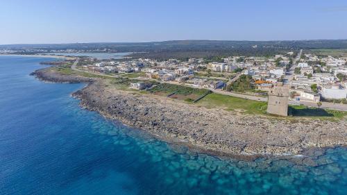 an aerial view of a small island in the water at Casa Tulipano 2 DX a soli 200 mt dal mare di Torre Colimena in Torre Colimena