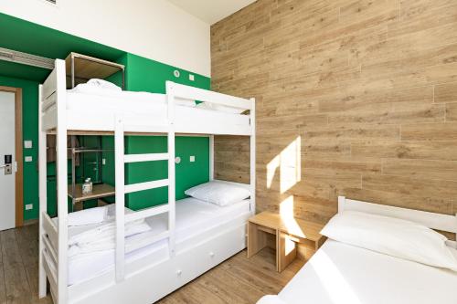 Postel nebo postele na pokoji v ubytování Hostel Link