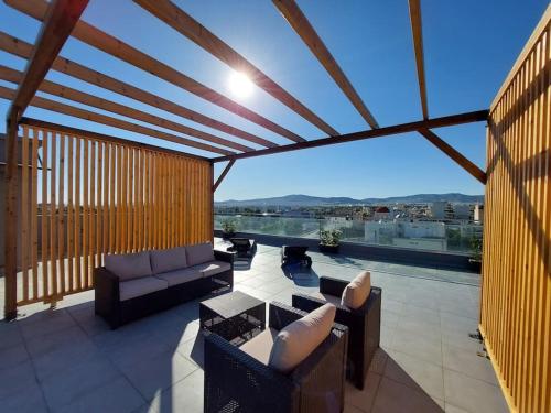Elegant & Spacious Apartment in Athens with Rooftop Acropolis View Access