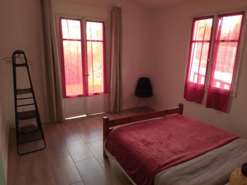 Postel nebo postele na pokoji v ubytování Gîte Timadam