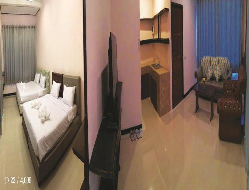 Katil atau katil-katil dalam bilik di Rao Ga Khao Resort