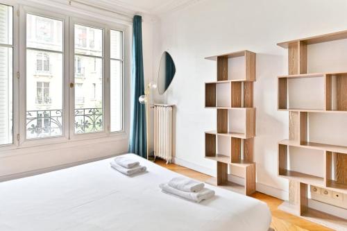 Appartement Haussmannien lumineux et central