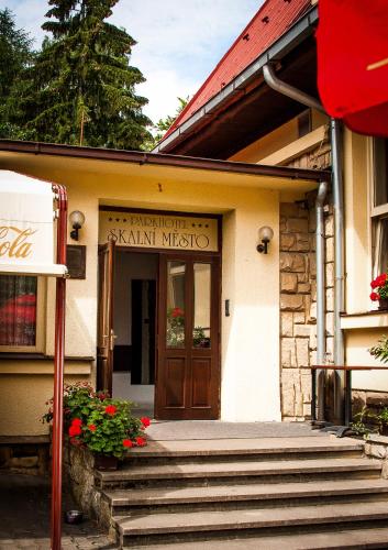a building with the entrance to a small museum at Parkhotel Skalní město in Jičín