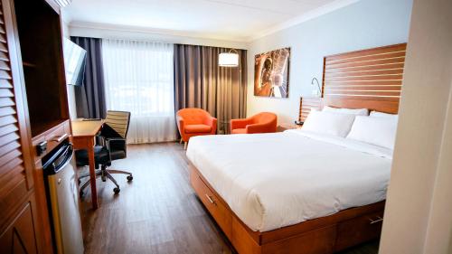 Cama o camas de una habitación en Hôtel Lindbergh par JARO