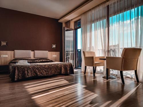Postel nebo postele na pokoji v ubytování Family Hotel Casa del Mare