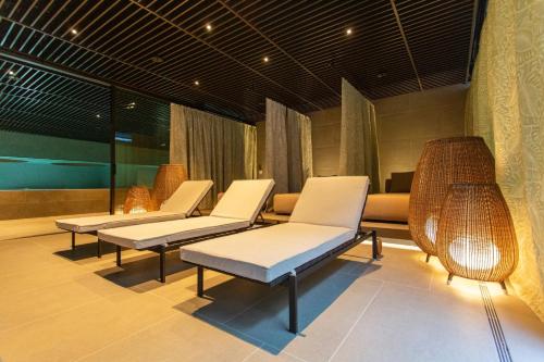 a row of chairs in a waiting room at Keight Hotel Opatija, Curio Collection By Hilton in Opatija
