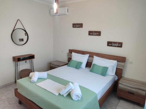 Postel nebo postele na pokoji v ubytování Elite Suites