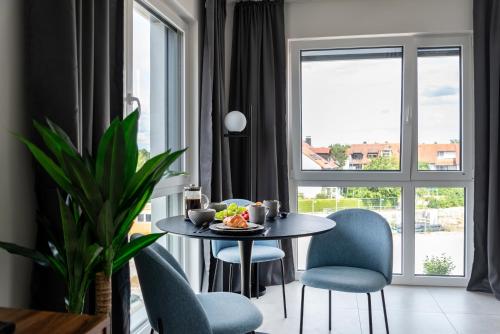 Et opholdsområde på MOONLIVING Boutique Apartments by Munich