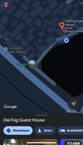 a screenshot of a cell phone screen with ajad fox guest house at Dal Fog Guest House in Srinagar