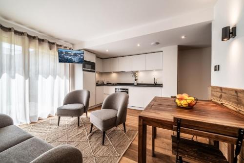 Η κουζίνα ή μικρή κουζίνα στο Apartment Poppy Les Gets - by EMERALD STAY