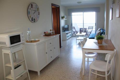 Kuchyň nebo kuchyňský kout v ubytování Apto. MdM