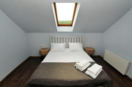 Una cama o camas en una habitación de Hotel Kazak Club