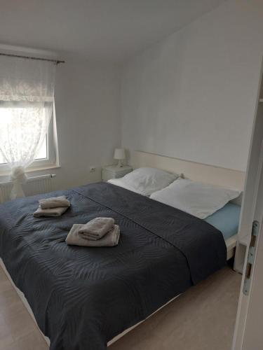 Postel nebo postele na pokoji v ubytování Apartmani Pavic