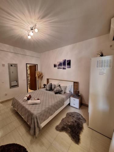 Posteľ alebo postele v izbe v ubytovaní Apartman Valeria