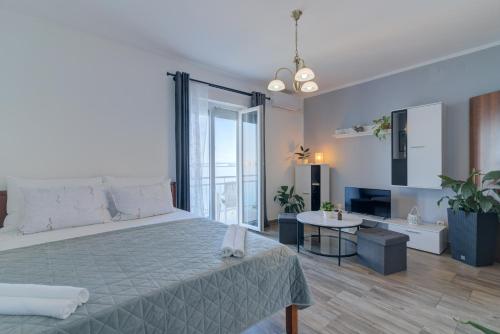 Posteľ alebo postele v izbe v ubytovaní Ivan apartman