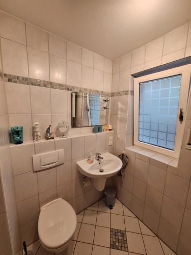 Ένα μπάνιο στο Ferienwohnung Funk