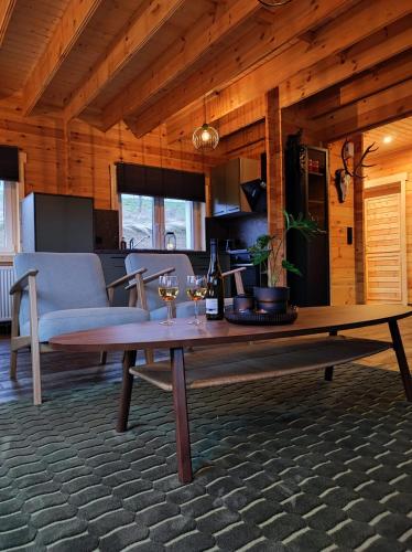 Χώρος καθιστικού στο Vakantiehuis aan bosrand in Eifel nabij Cochem-Zell aan de Moezel - Dichtbij De Calmont Klettersteig Bremm - Green House