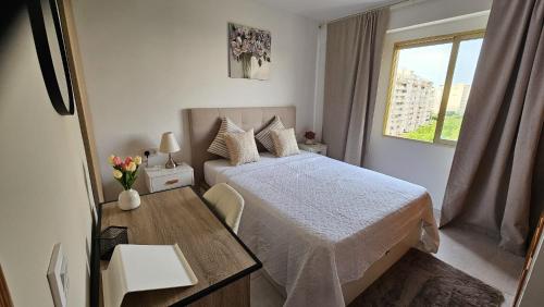Postel nebo postele na pokoji v ubytování Elegante apartamento en Playa de Gandía