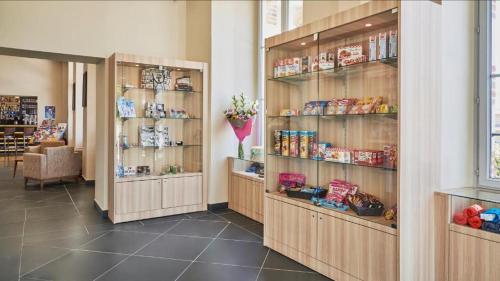 a store with shelves of food in a room at Studio résidence touristique 3 étoiles in Le Mée-sur-Seine