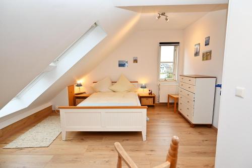 Giường trong phòng chung tại Ferienhaus Dörte