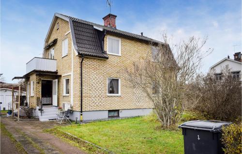 an old brick house on the side of a street at 2 Bedroom Nice Apartment In Hultsfred in Hultsfred