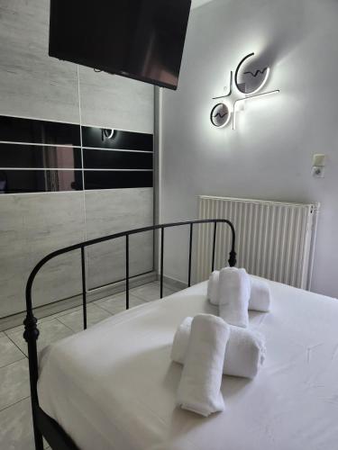 Ένα ή περισσότερα κρεβάτια σε δωμάτιο στο Sarri Holiday Home
