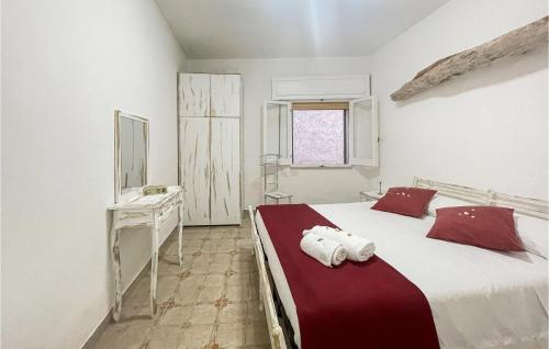 A bed or beds in a room at Stunning Home In Marina Di Lizzano