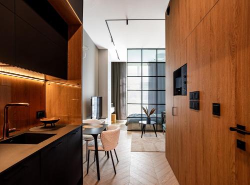 TV a/nebo společenská místnost v ubytování Apartamenty na Kazamatach 24 Old Town Wroclaw