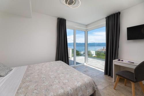 Postel nebo postele na pokoji v ubytování Villa Volare