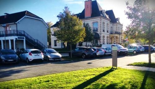 a group of cars parked in a parking lot at Studio résidence touristique 3 étoiles in Le Mée-sur-Seine