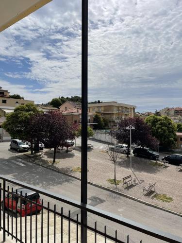 a view from a window of a parking lot at Sirolo appartamenti in Sirolo