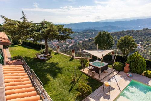 an image of a backyard with a swimming pool at Il Mirto B&B in Imperia