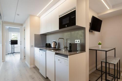 Η κουζίνα ή μικρή κουζίνα στο Aparthotel Vilassar