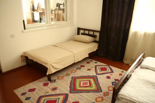 Collage Guesthouseにあるベッド