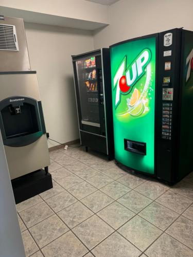 a drink machine and a video game vending machine at Comfort Inn Huntington near University area in Huntington