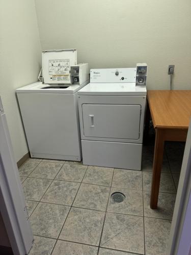 two appliances are sitting on top of a stove at Comfort Inn Huntington near University area in Huntington