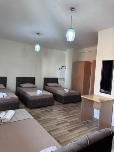 Postel nebo postele na pokoji v ubytování Hotel Balkan