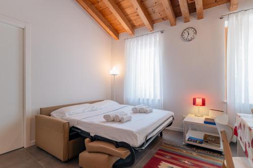 Letto o letti in una camera di San Zen Che Ride