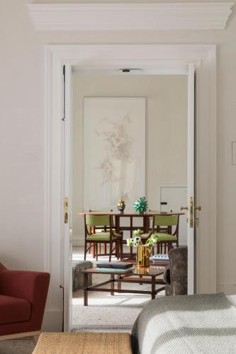 a room with a table and a dining room at Palazzo Maritati in Nardò