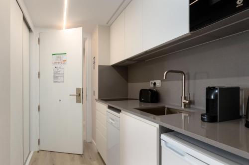 Η κουζίνα ή μικρή κουζίνα στο Aparthotel Vilassar