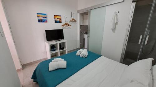 Giường trong phòng chung tại Borgo28