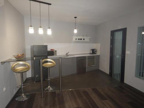 Kuchyň nebo kuchyňský kout v ubytování Sunshine terrace
