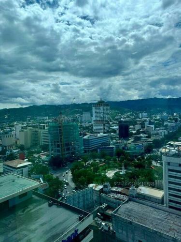 a view of a city from the top of a building at Relaxing Loft Unit in Cebu City in Cebu City