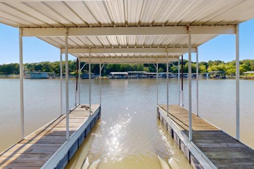 a dock on a body of water at JJ's Great Escape in Eufaula