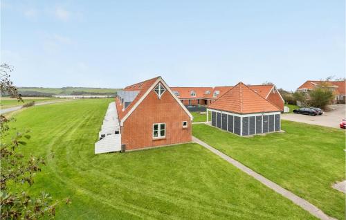 an aerial view of a house and a building at Gorgeous Apartment In Lemvig in Lemvig